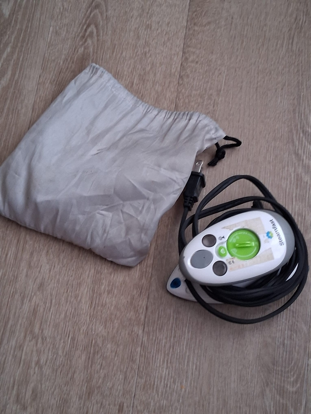 White and Green Electric Handheld Device with Carry Pouch